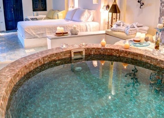 Honeymoon suite with private couples Jacuzzi @ Astarte Suites Santorini 