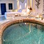 Honeymoon suite with private couples Jacuzzi @ Astarte Suites Santorini 