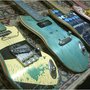 RECYCLED SKATEBOARD GUITARS